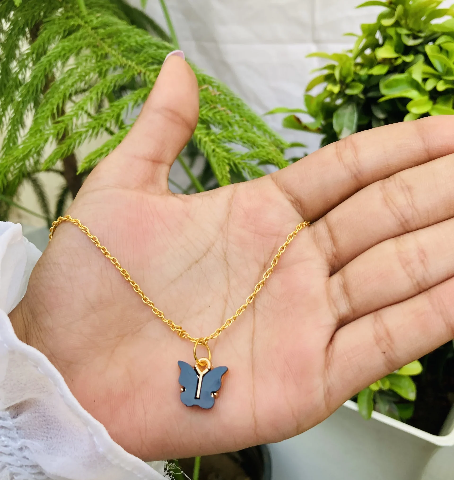 Gold Chain Necklace with Black Butterfly Pendant – Minimal Elegant Style