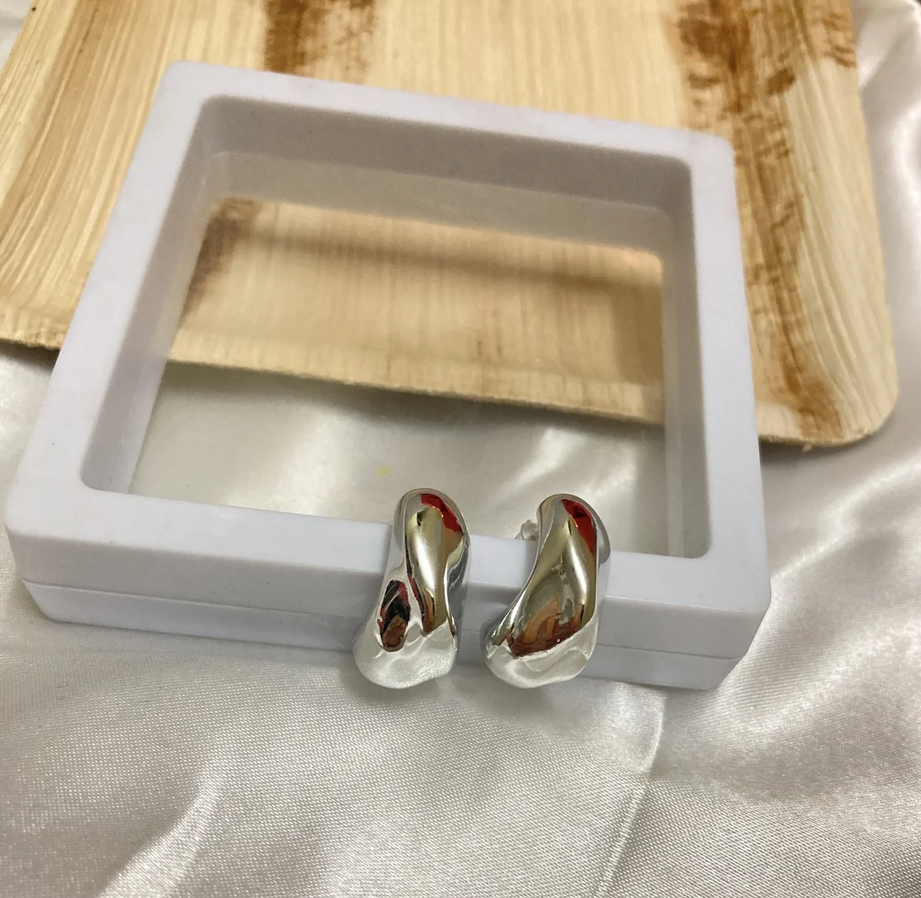 Vamika Liquid Silver Sculptural Earrings